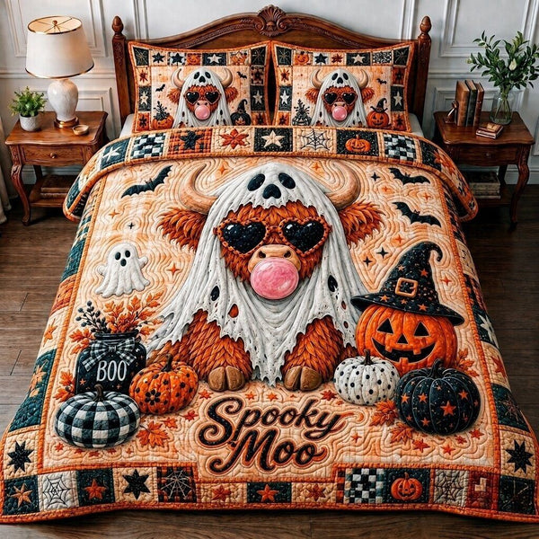 Spooky Cow quilted 3-piece bedding set on a made bed against a dark styled interior