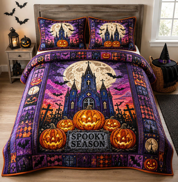 Spooky Moonlight Cathedral quilted 3-piece bedding set on a made bed against a dark styled interior