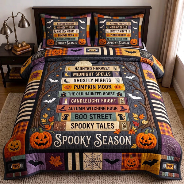 Spooky Season quilted 3-piece bedding set on a made bed against a dark styled interior