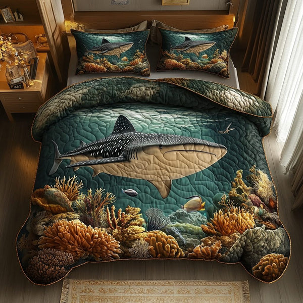 Spotted Grace quilted 3-piece bedding set on a made bed with two matching pillow shams