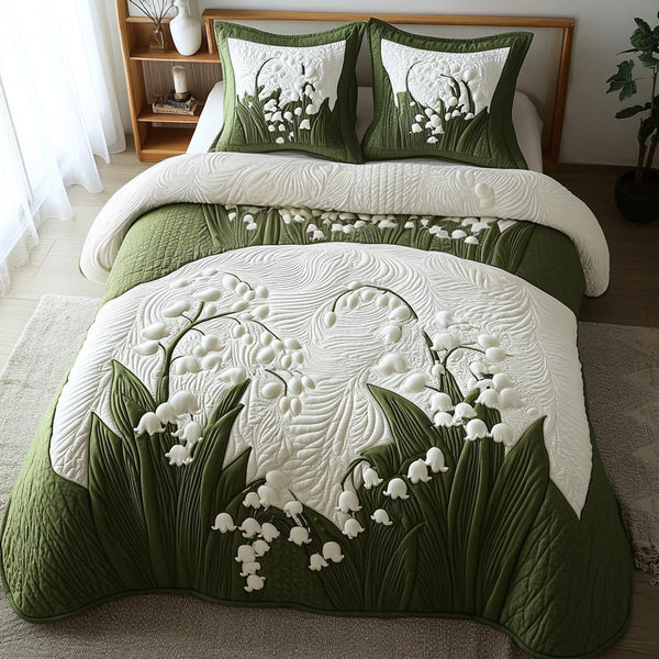 Spring Bells quilted 3-piece bedding set on a made bed with two matching pillow shams