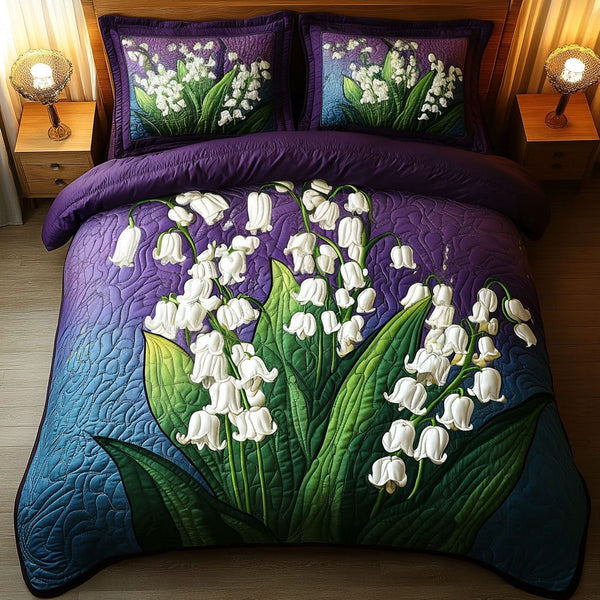 Spring Blooms quilted 3-piece bedding set on a made bed with two matching pillow shams
