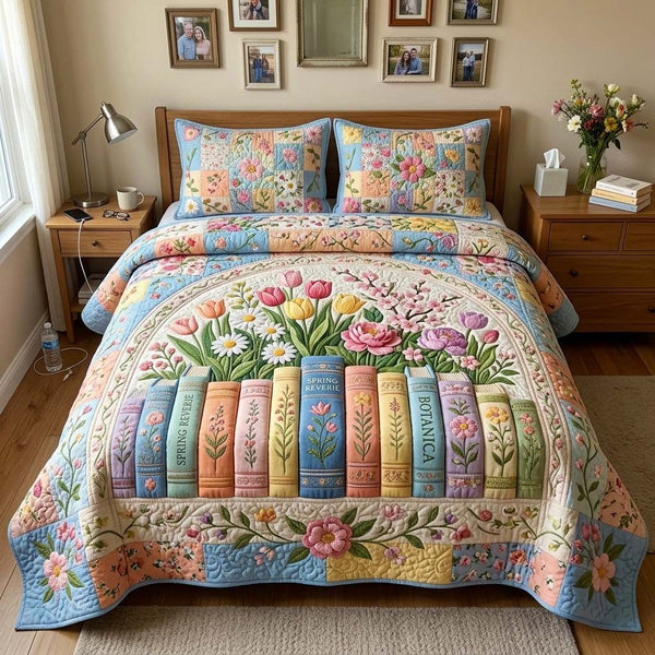 Spring Books quilted 3-piece bedding set on a made bed with two matching pillow shams