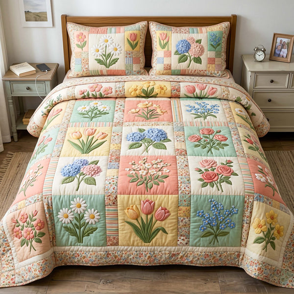 Spring Bouquet quilted 3-piece bedding set on a made bed with two matching pillow shams