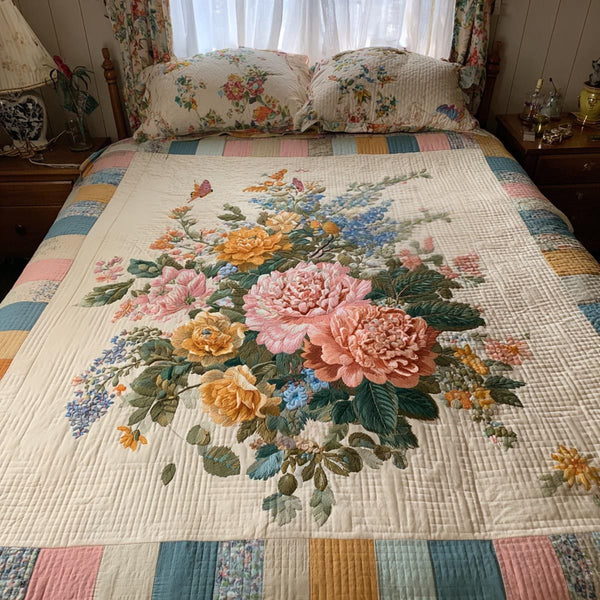 Spring Bouquet quilted 3-piece bedding set on a made bed with two matching pillow shams