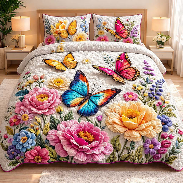 Spring Butterflies quilted 3-piece bedding set on a made bed with two matching pillow shams
