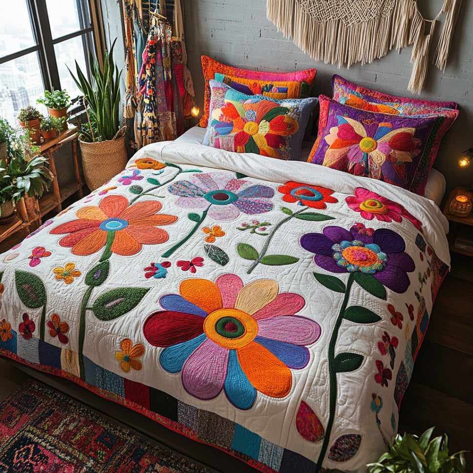 Spring Drift quilted 3-piece bedding set on a made bed with two matching pillow shams