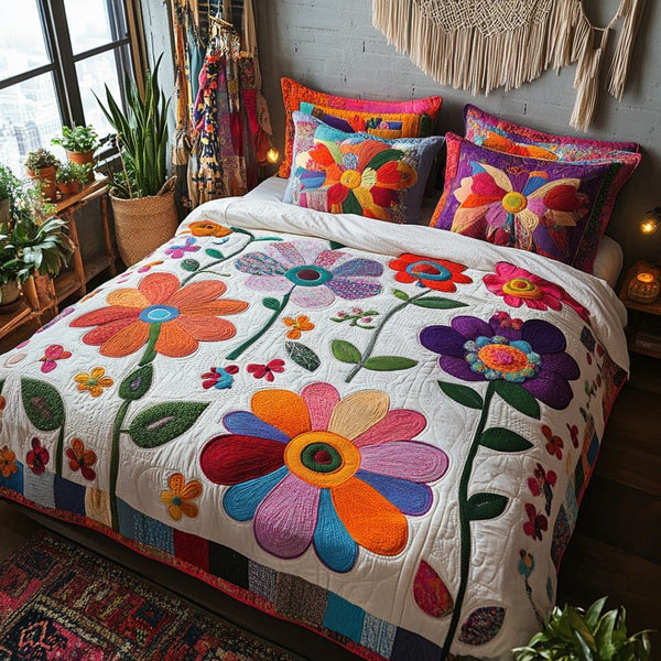 Spring Drift quilted 3-piece bedding set on a made bed with two matching pillow shams