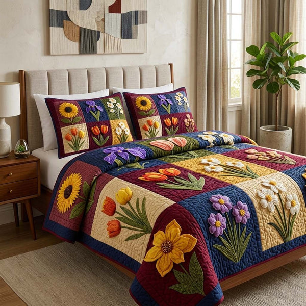 Spring Garden quilted 3-piece bedding set on a made bed with two matching pillow shams