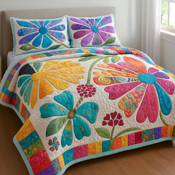 Spring Garden quilted 3-piece bedding set on a made bed with two matching pillow shams