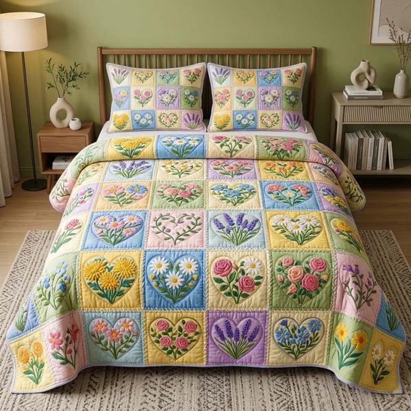 Spring Heart quilted 3-piece bedding set on a made bed with two matching pillow shams