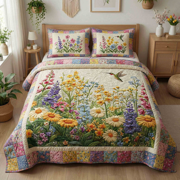 Spring Meadow Bloom quilted 3-piece bedding set on a made bed with two matching pillow shams
