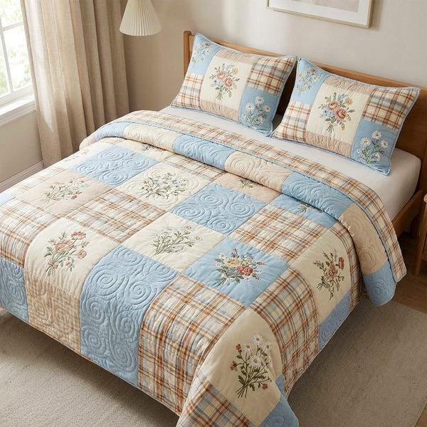 Spring Meadow quilted 3-piece bedding set on a made bed with two matching pillow shams