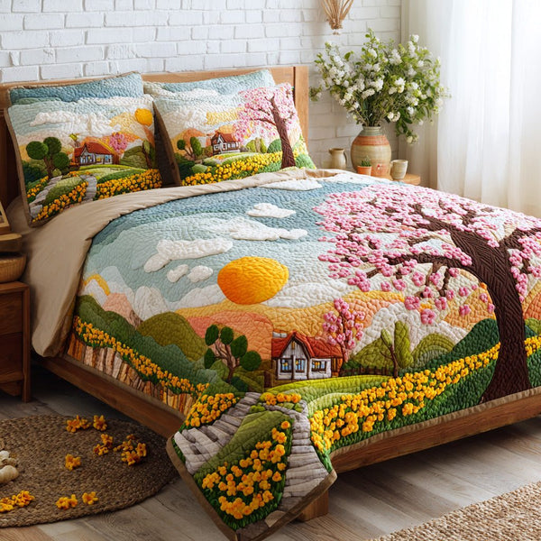 Spring Meadow quilted 3-piece bedding set on a made bed with two matching pillow shams