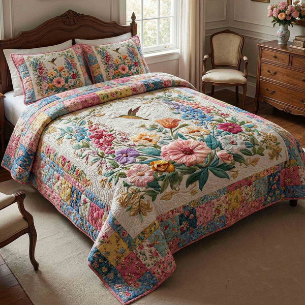 Spring quilted 3-piece bedding set on a made bed with two matching pillow shams