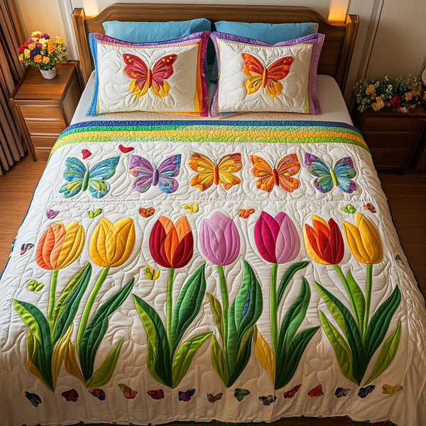 Spring Radiance quilted 3-piece bedding set on a made bed with two matching pillow shams