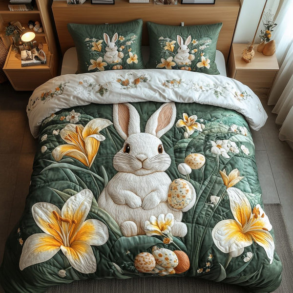 Spring Snuggles quilted 3-piece bedding set on a made bed with two matching pillow shams