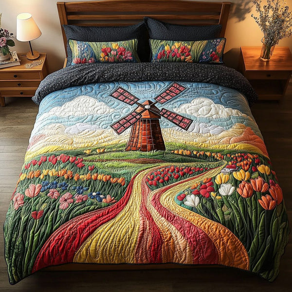 Spring Whirl quilted 3-piece bedding set on a made bed with two matching pillow shams
