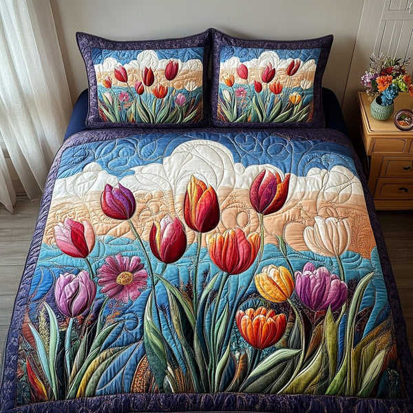 Spring Whispers quilted 3-piece bedding set on a made bed with two matching pillow shams