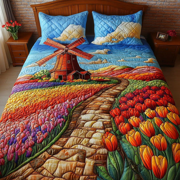 Spring Winds quilted 3-piece bedding set on a made bed with two matching pillow shams