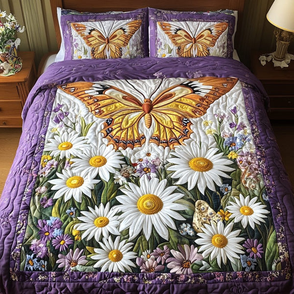 Spring Wings quilted 3-piece bedding set on a made bed with two matching pillow shams