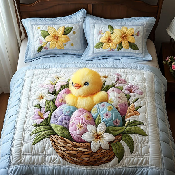 Springtime Blessings quilted 3-piece bedding set on a made bed with two matching pillow shams