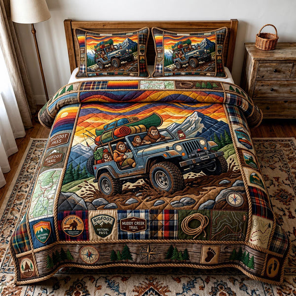 Squatch Trails quilted 3-piece bedding set on a made bed with two matching pillow shams