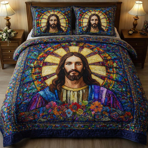 Stained Grace quilted 3-piece bedding set on a made bed with two matching pillow shams