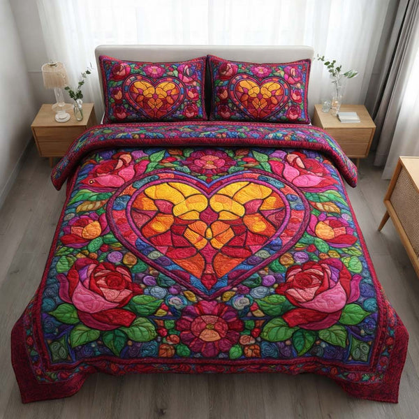 Stained Heart quilted 3-piece bedding set on a made bed with two matching pillow shams