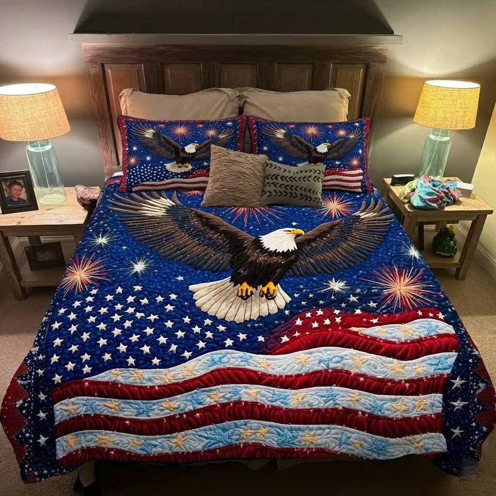 Star Banner quilted 3-piece bedding set on a made bed with two matching pillow shams