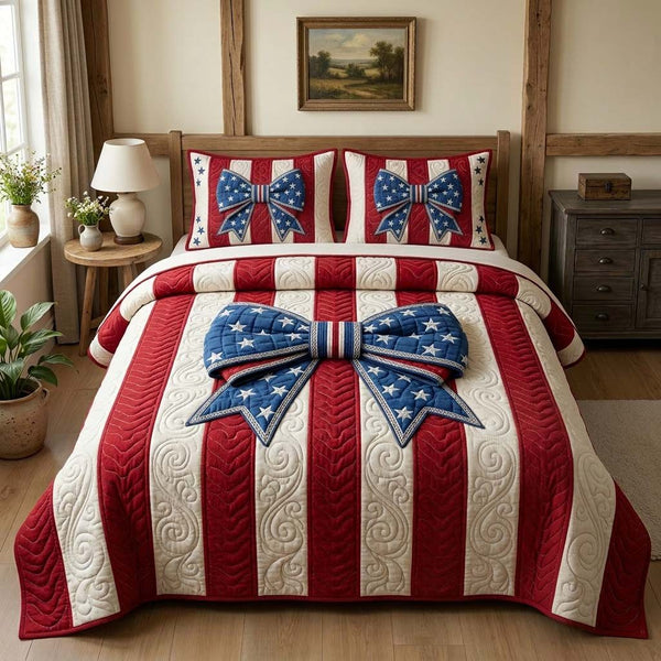Star Bow quilted 3-piece bedding set on a made bed with two matching pillow shams