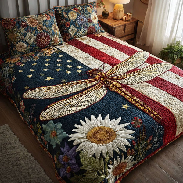 Star-Spangled Flight quilted 3-piece bedding set on a made bed in a warmly lit bedroom