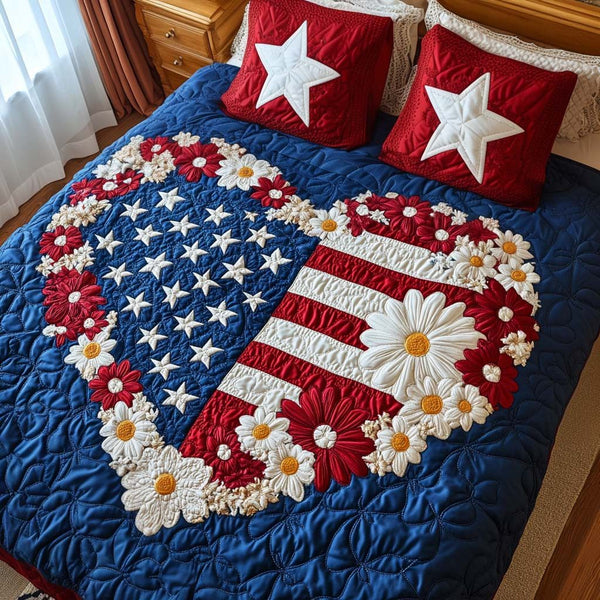 Star Spangled Heart quilted 3-piece bedding set on a made bed in a warmly lit bedroom