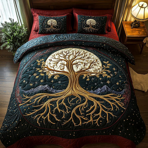 Starbound Tree quilted 3-piece bedding set on a made bed with two matching pillow shams