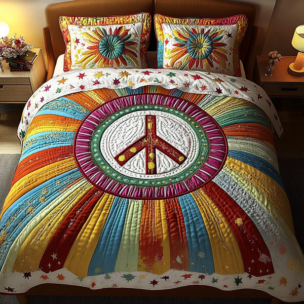 Starburst Peace quilted 3-piece bedding set on a made bed with two matching pillow shams