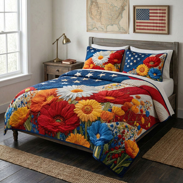 Starfield Floral Pride quilted 3-piece bedding set on a made bed with two matching pillow shams
