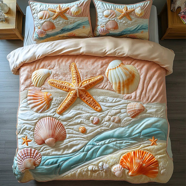 Starfish Serenity quilted 3-piece bedding set on a made bed in a light coastal bedroom