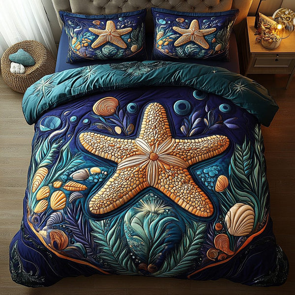Starfish Serenity quilted 3-piece bedding set on a made bed in a light coastal bedroom