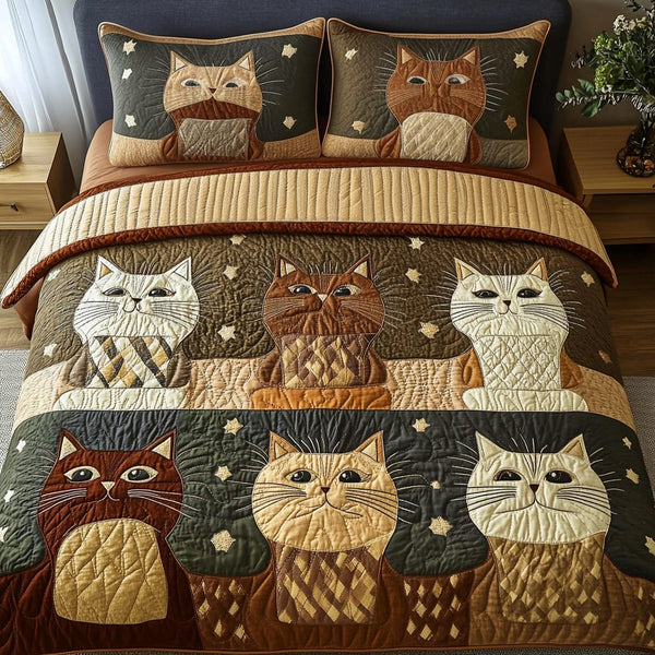 Starlight Cat Tales quilted 3-piece bedding set on a made bed with two matching pillow shams