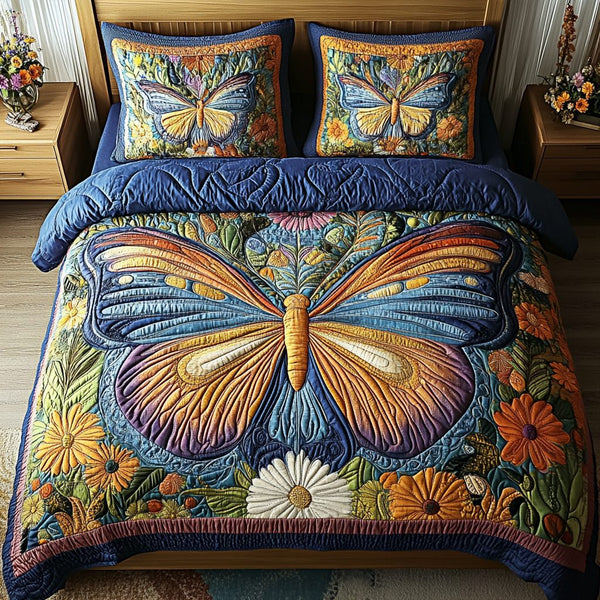 Starlight Meadow quilted 3-piece bedding set on a made bed with two matching pillow shams