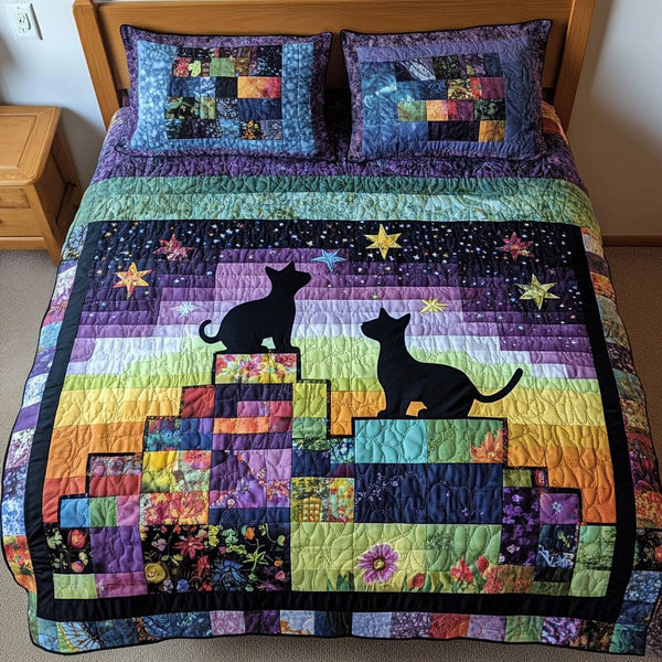 Starlit Companions quilted 3-piece bedding set on a made bed with two matching pillow shams