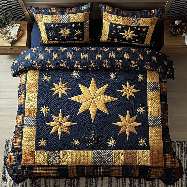 Starlit Dream quilted 3-piece bedding set on a made bed with two matching pillow shams