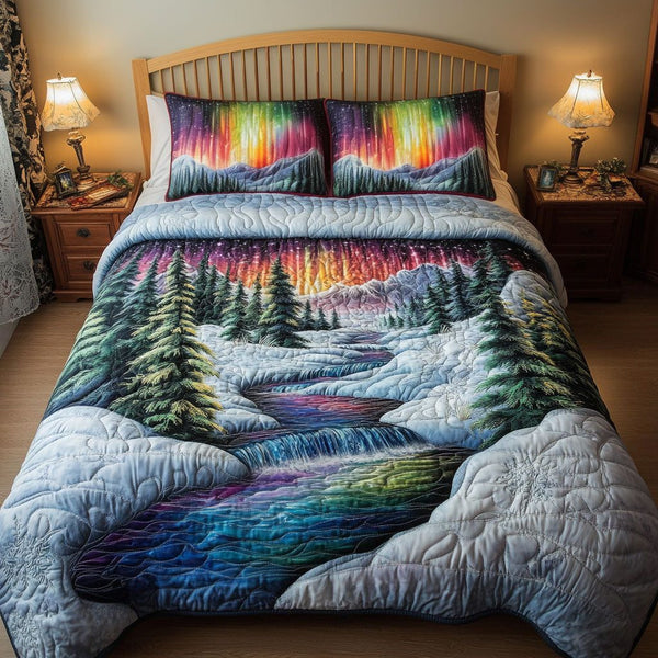 Starlit River quilted 3-piece bedding set on a made bed with two matching pillow shams
