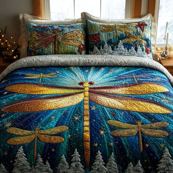 Starlit Wings quilted 3-piece bedding set on a made bed with two matching pillow shams