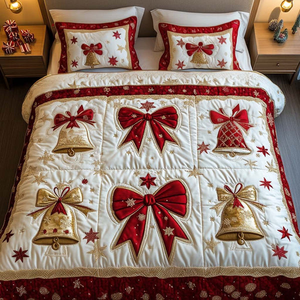 Starry Bells quilted 3-piece bedding set on a made bed with two matching pillow shams