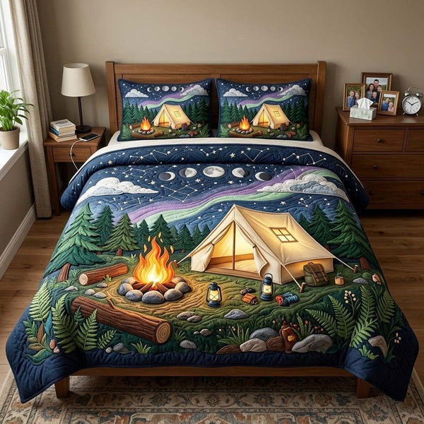 Starry Camp Night quilted 3-piece bedding set on a made bed with two matching pillow shams