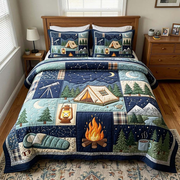Starry Camp quilted 3-piece bedding set on a made bed with two matching pillow shams