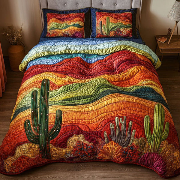 Starry Dunes quilted 3-piece bedding set on a made bed with two matching pillow shams