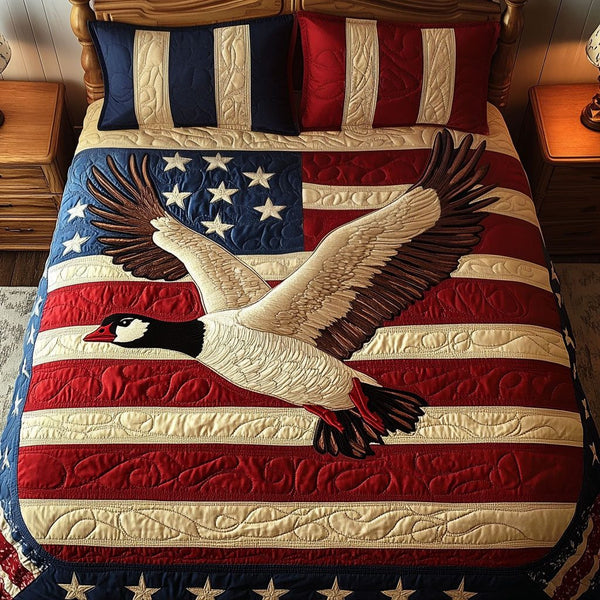Starry Flight quilted 3-piece bedding set on a made bed with two matching pillow shams