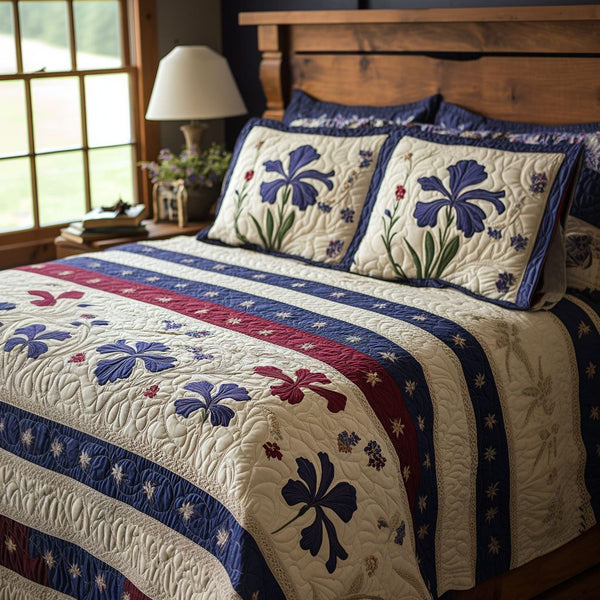 Starry Garden quilted 3-piece bedding set on a made bed with two matching pillow shams